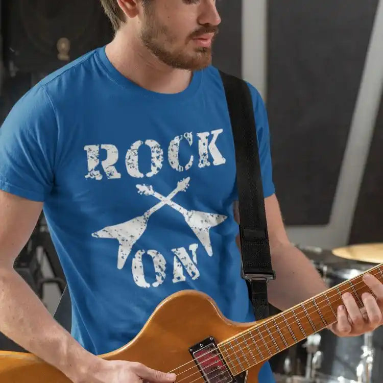 Blue t-shirt with ’Rock On’ graphic.