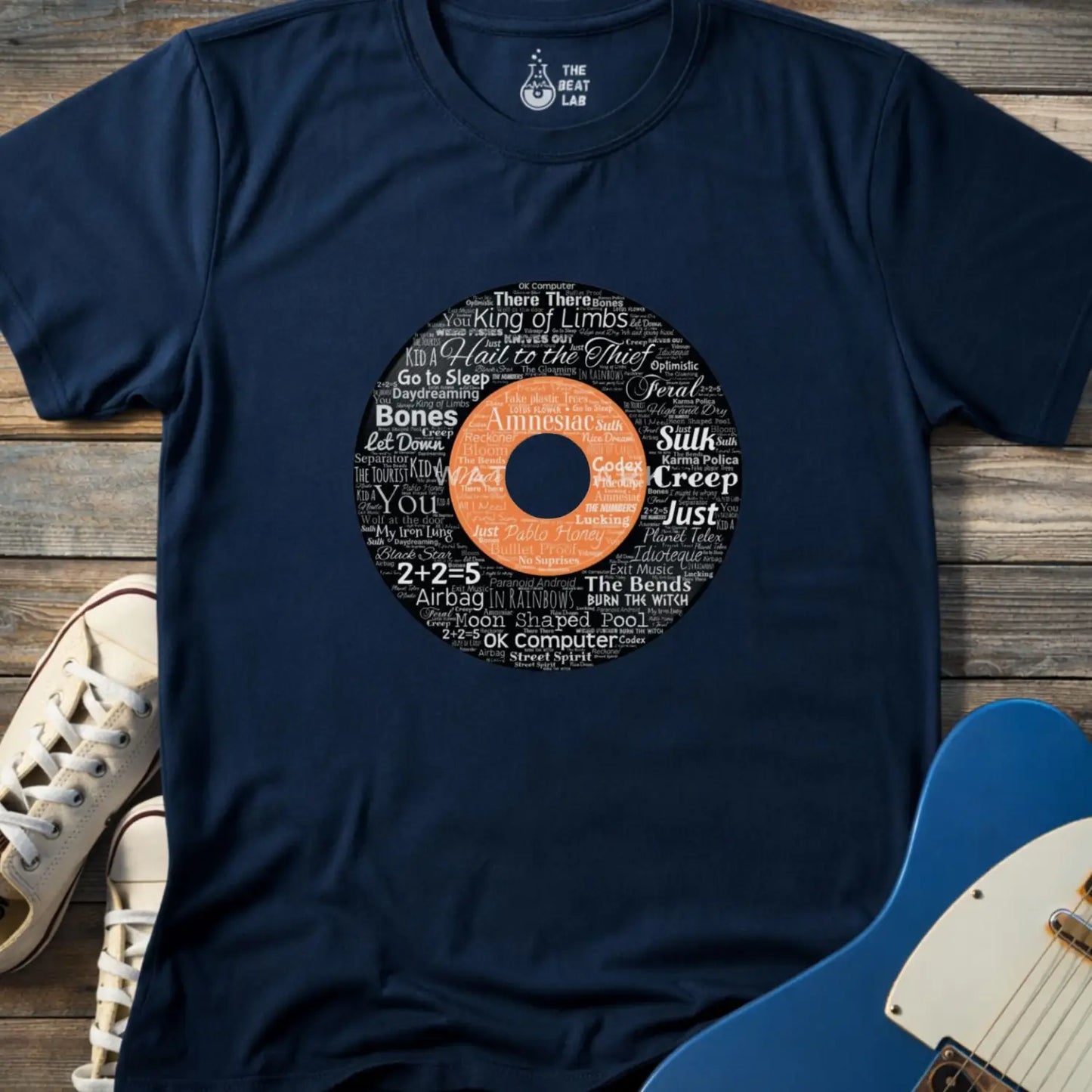 Navy blue color unisex adult shirt featuring Radiohead rock band Albums collage