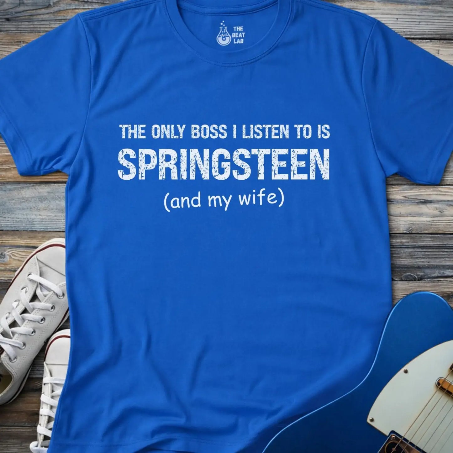Royal blue color of gildan 64000 t-shirt featuring funny music quote the only boss I listen to is springsteen and my wife, bruce springsteen shirt