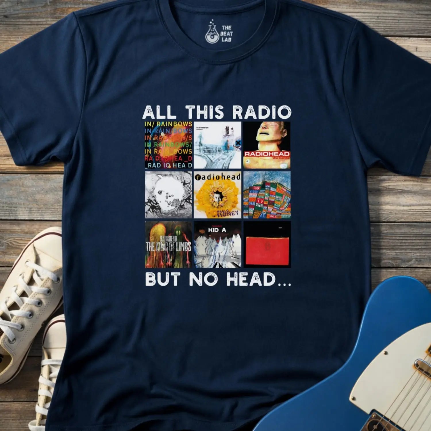 Navy blue color of adult unisex gildan 64000 shirt featuring funny radiohead rock band albums, all this radio but no head