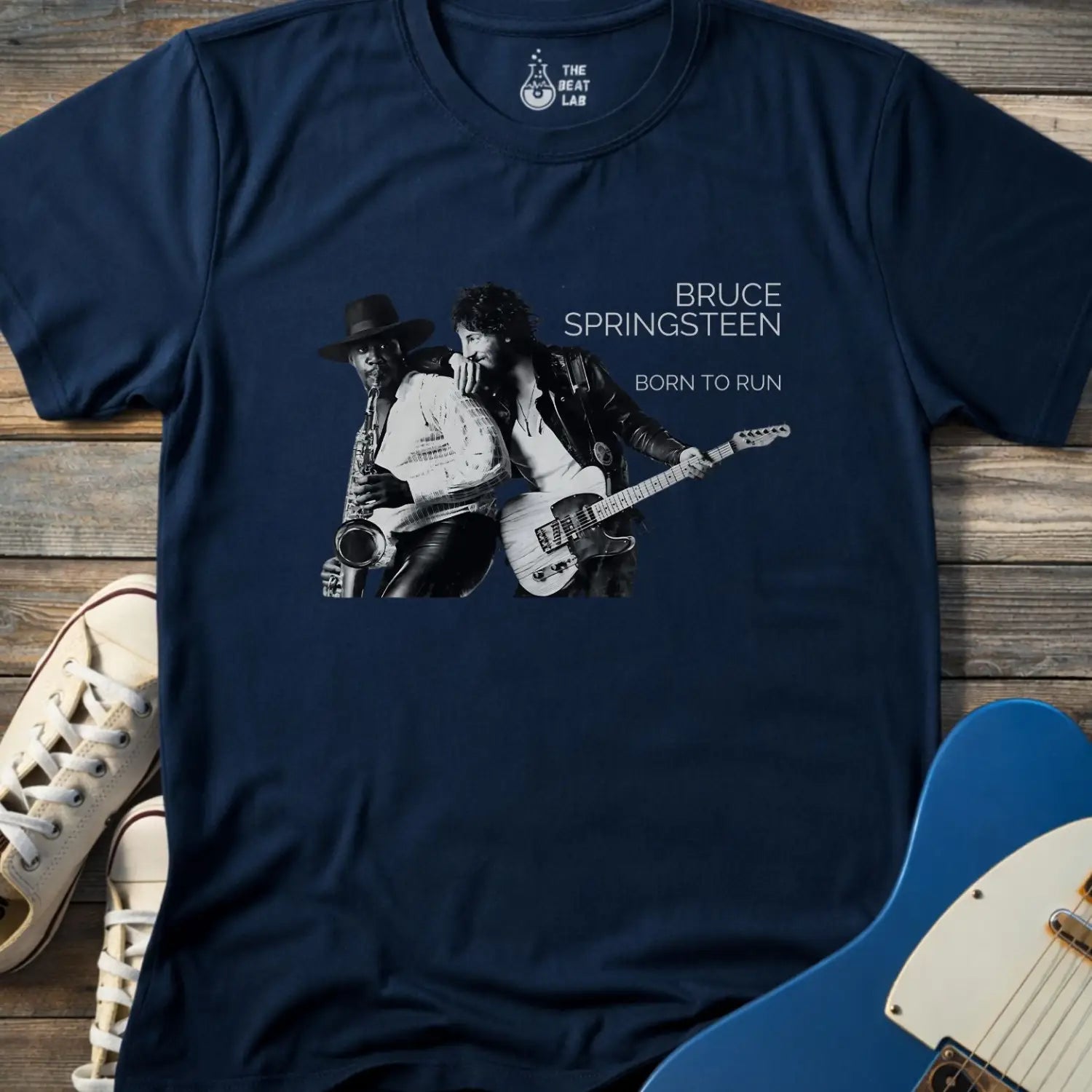 Navy blue color adult unisex gildan 64000 shirt featuring Born to run studio album by e street band bruce springsteen 1975
