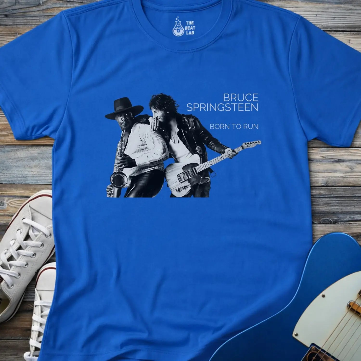 Royal blue color adult unisex gildan 64000 shirt featuring Born to run studio album by e street band bruce springsteen 1975