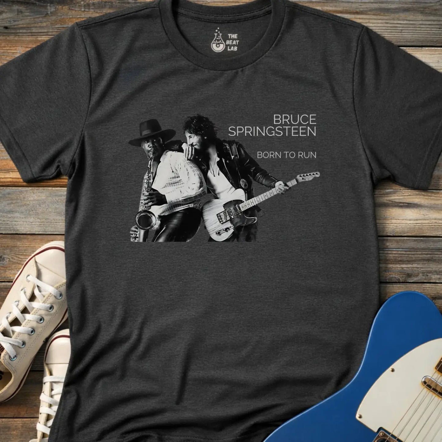 Dark heather grey color adult unisex gildan 64000 shirt featuring Born to run studio album by e street band bruce springsteen 1975