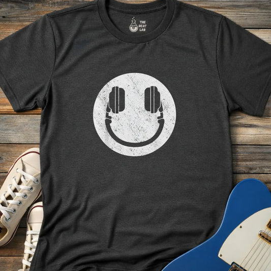 Distressed white DJ smiley face design with headphone eyes on a dark heather color adult women men gildan 64000 shirt