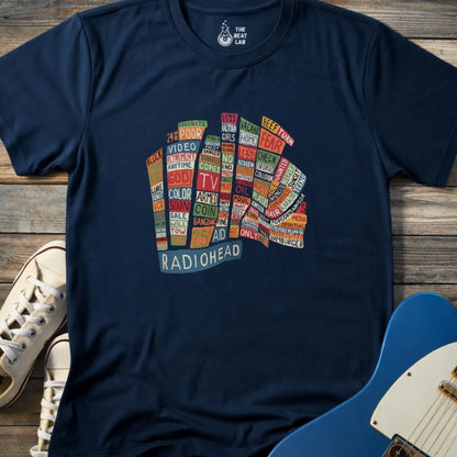 Navy blue color adult unisex t-shirt gildan 64000 Radiohead Hail to the Thief graphic t-shirt featuring a bear-shaped block of colorful words and a RADIOHEAD label beneath.