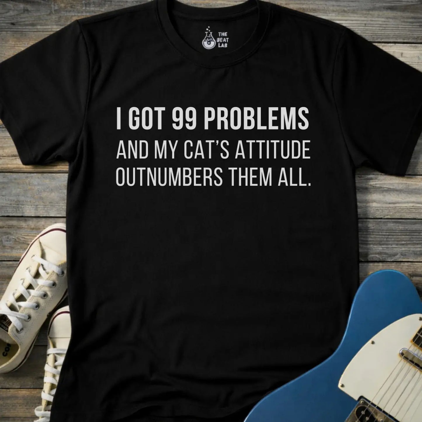 Black color gildan 64000 unisex music shirt featuring jay z funny 99 problems graphic text "I got 99 problems and my cat’s attitude outnumbers them all".