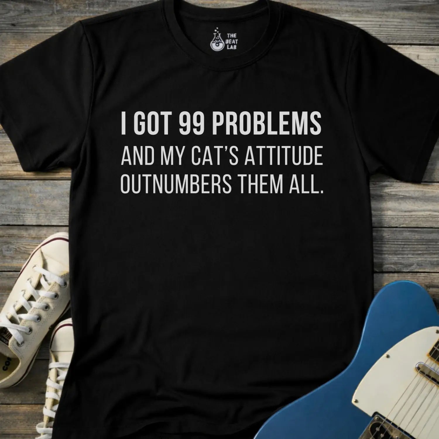 Black color gildan 64000 unisex music shirt featuring jay z funny 99 problems graphic text "I got 99 problems and my cat’s attitude outnumbers them all".