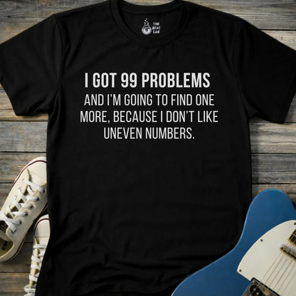 Black gildan 64000 men women adult shirt with bold white text: “I got 99 problems and I’m going to find one more, because I don’t like uneven numbers” funny math humor design, funny Jay-z song 99 problems 
