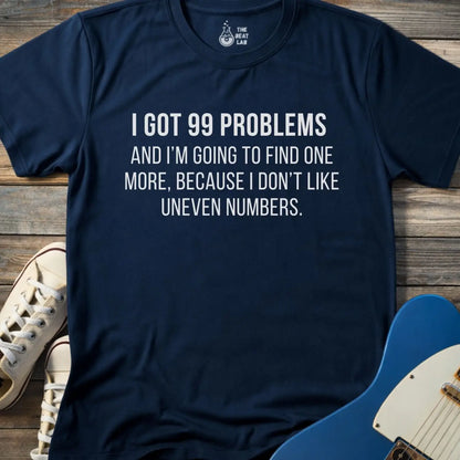 Navy blue gildan 64000 men women adult shirt with bold white text: “I got 99 problems and I’m going to find one more, because I don’t like uneven numbers” funny math humor design, funny Jay-z song 99 problems 