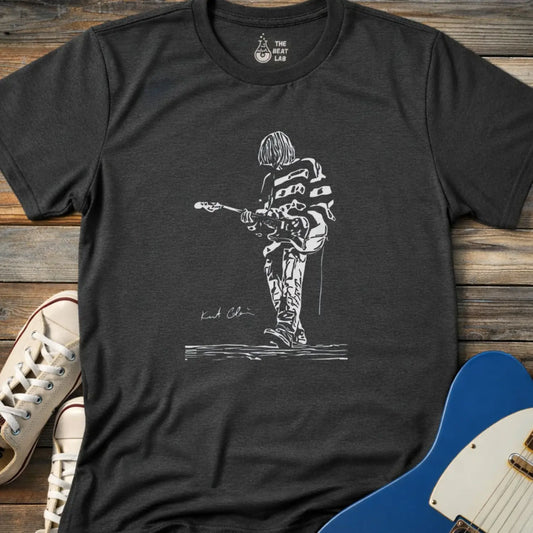 
Dark heather grey color of adult unisex shirt featuring Kurt Cobain of Nirvana American Rock band concert music