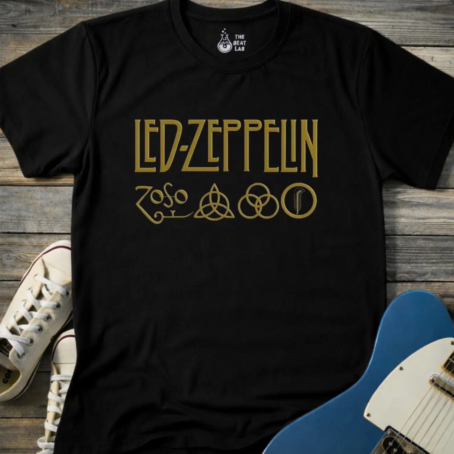 Black color adult unisex t-shirt gildan 64000 of Led Zeppelin Zoso symbols t-shirt with gold LED ZEPPELIN text and four iconic band symbols across the chest.