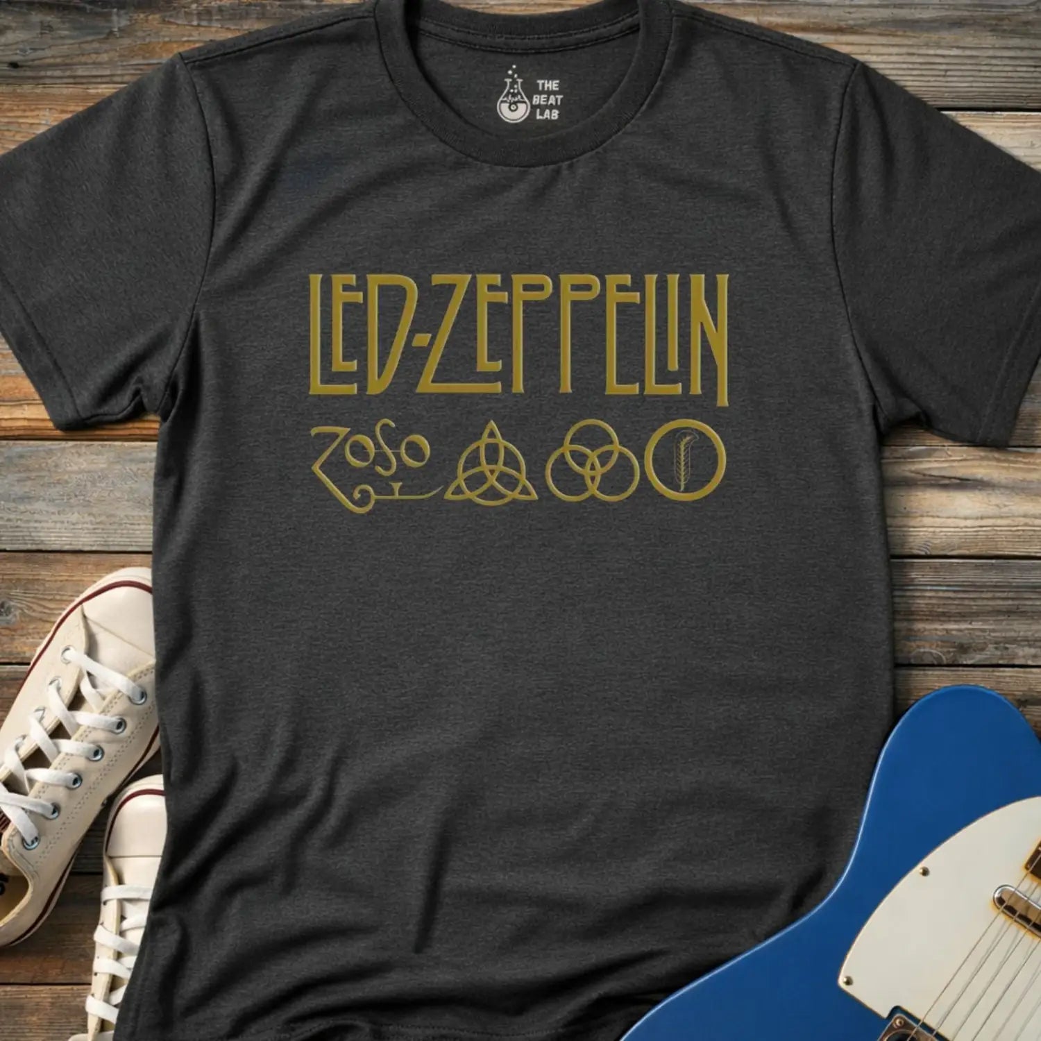 Dark Heather Grey color adult unisex t-shirt gildan 64000 of Led Zeppelin Zoso symbols t-shirt with gold LED ZEPPELIN text and four iconic band symbols across the chest.