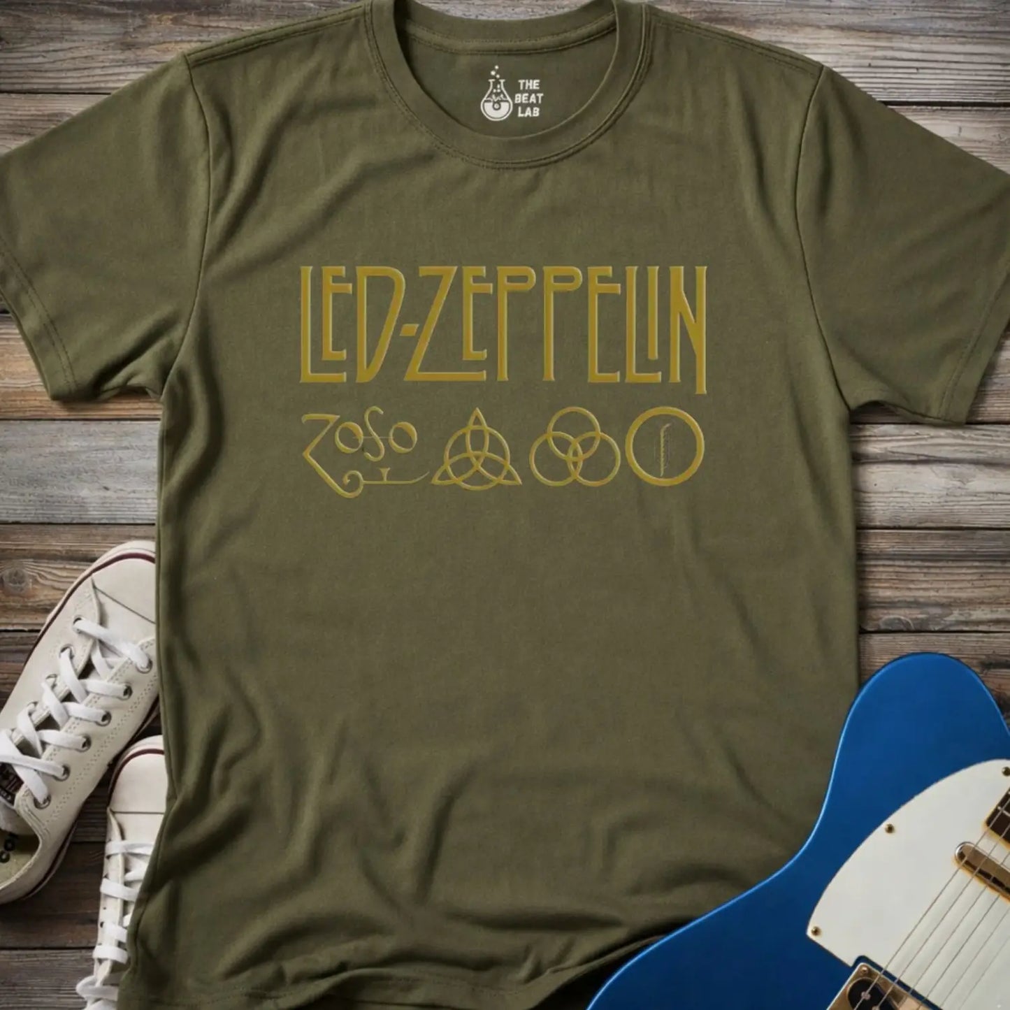 Military Green color adult unisex t-shirt gildan 64000 of Led Zeppelin Zoso symbols t-shirt with gold LED ZEPPELIN text and four iconic band symbols across the chest.