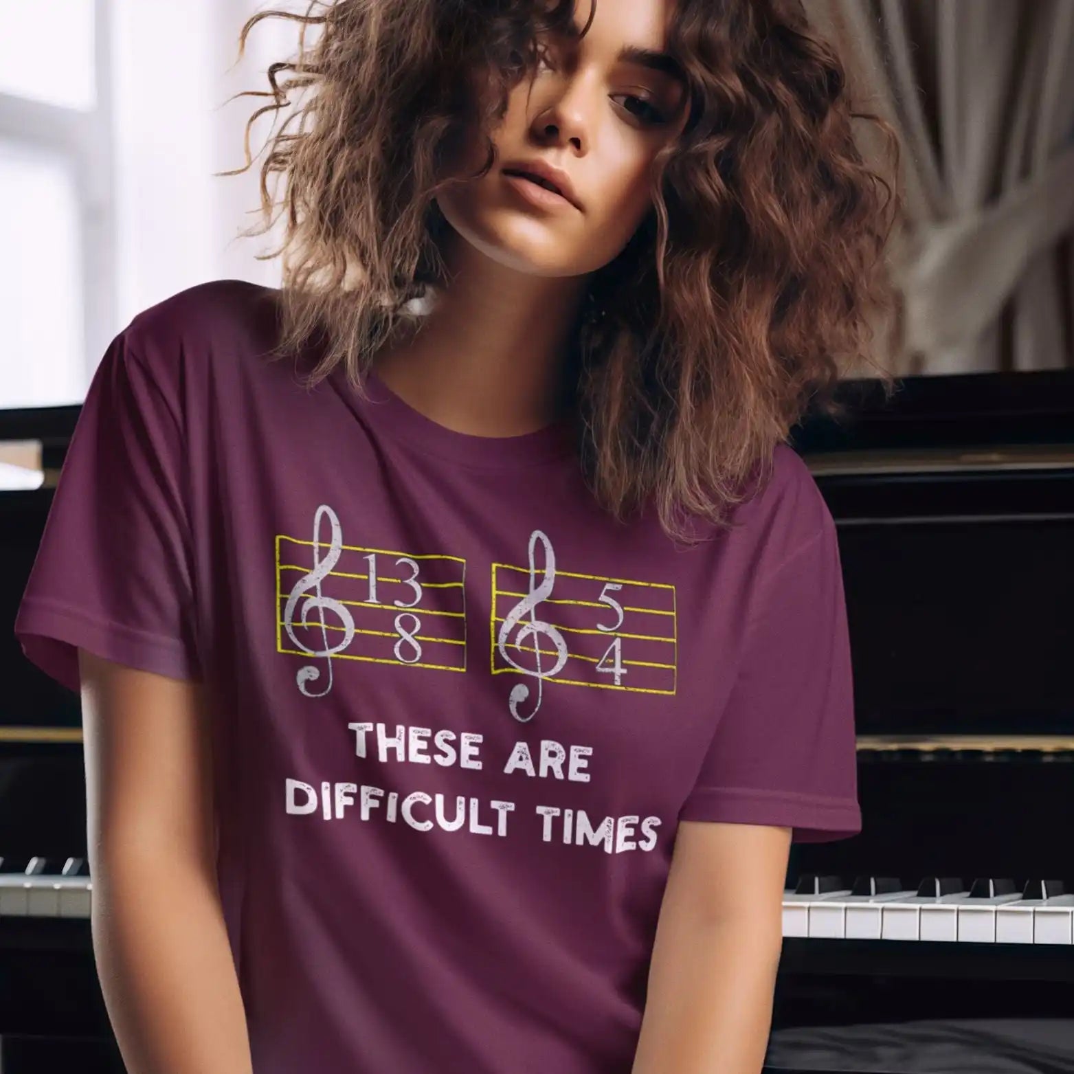 Maroon t-shirt with musical notation.