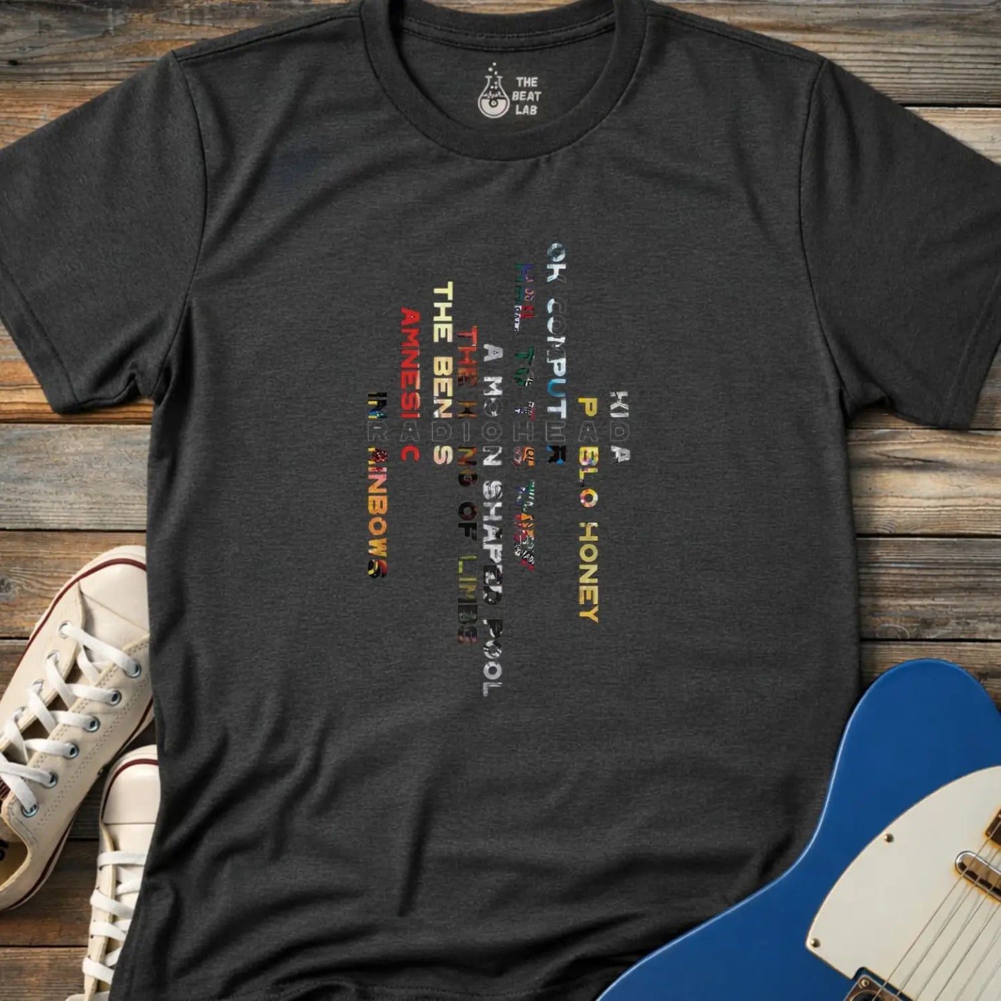 Dark heather grey color unisex adult shirt featuring Radiohead rock band Albums collage