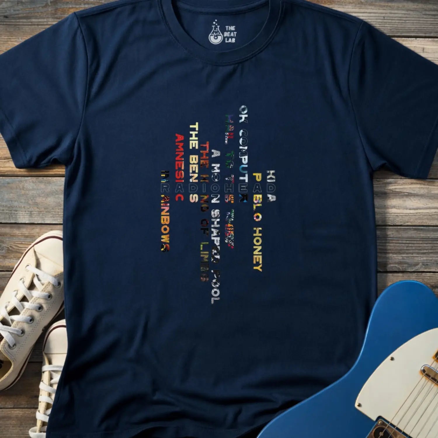 Navy blue color unisex adult shirt featuring Radiohead rock band Albums collage
