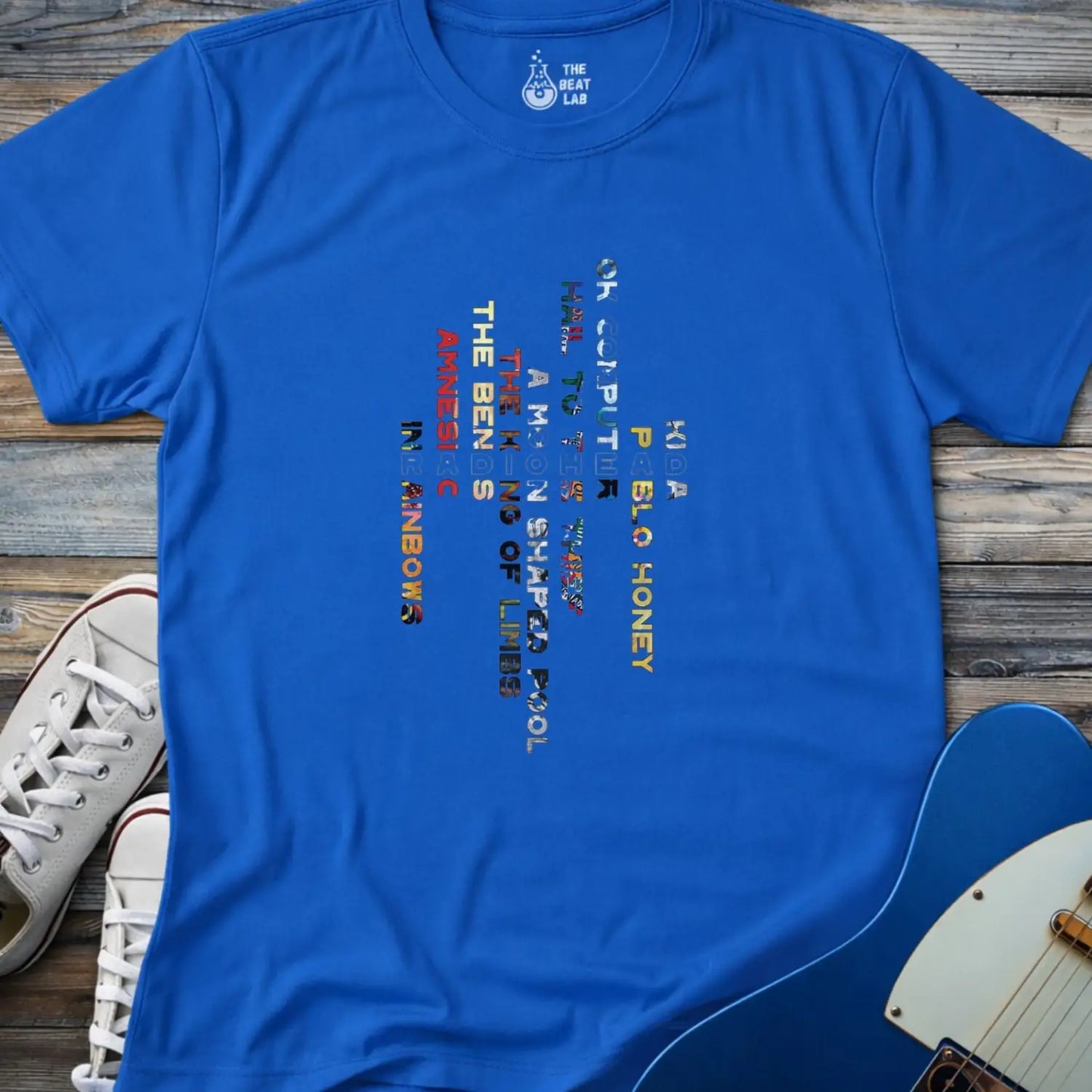 Royal blue color unisex adult shirt featuring Radiohead rock band Albums collage