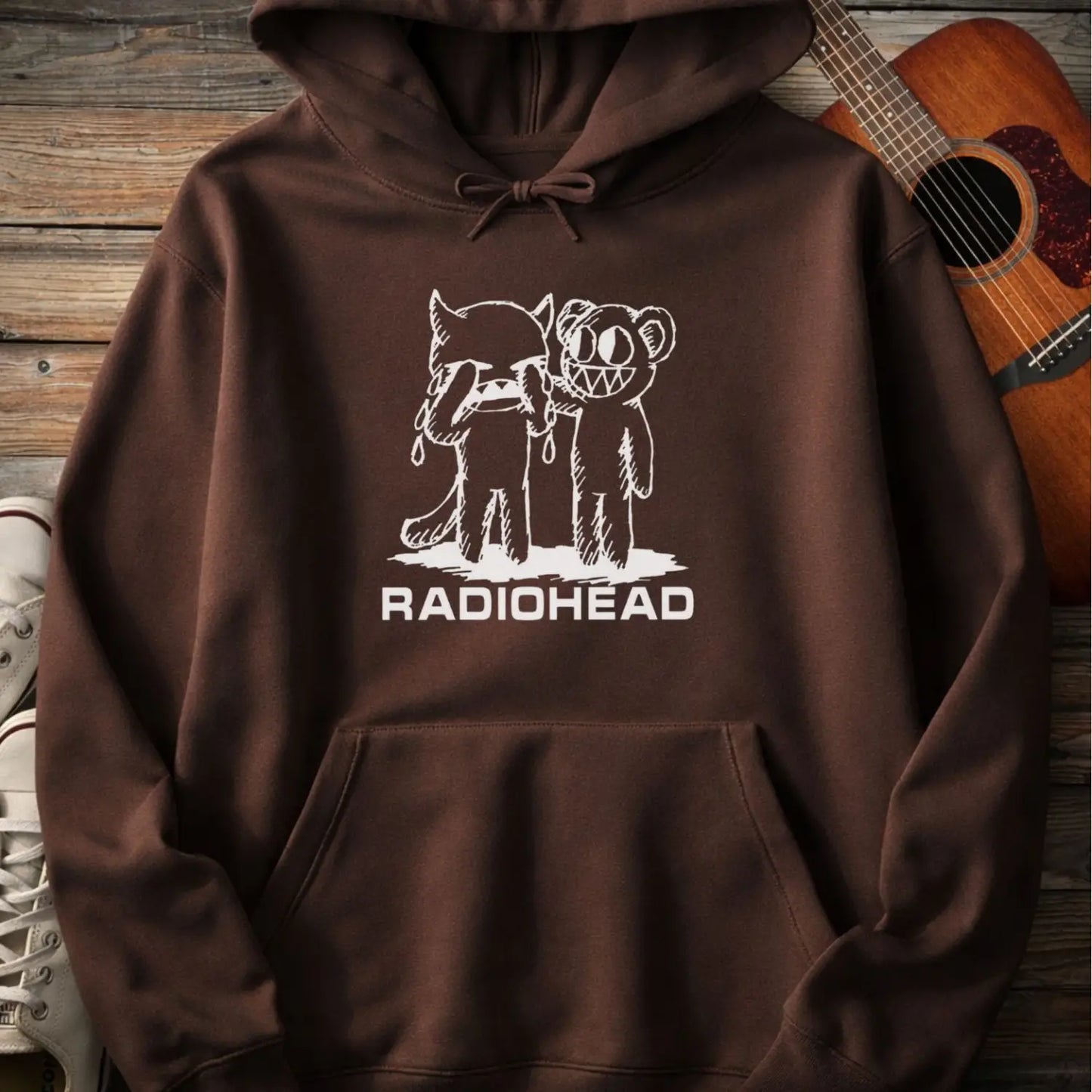 Dark chocolate pullover men women gildan hoodie with white bear character artwork graphic and “Radiohead” text design.