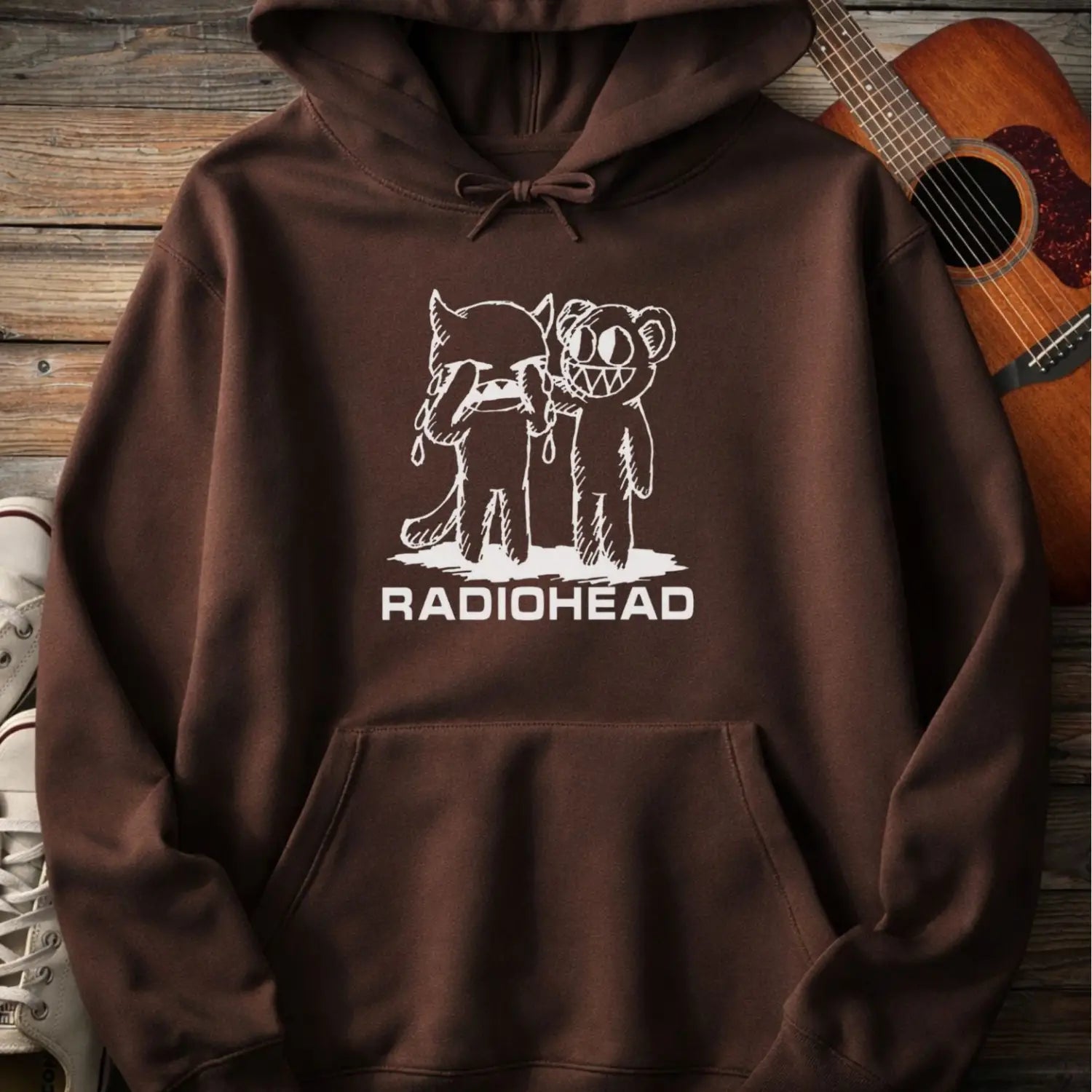 Dark chocolate pullover men women gildan hoodie with white bear character artwork graphic and “Radiohead” text design.