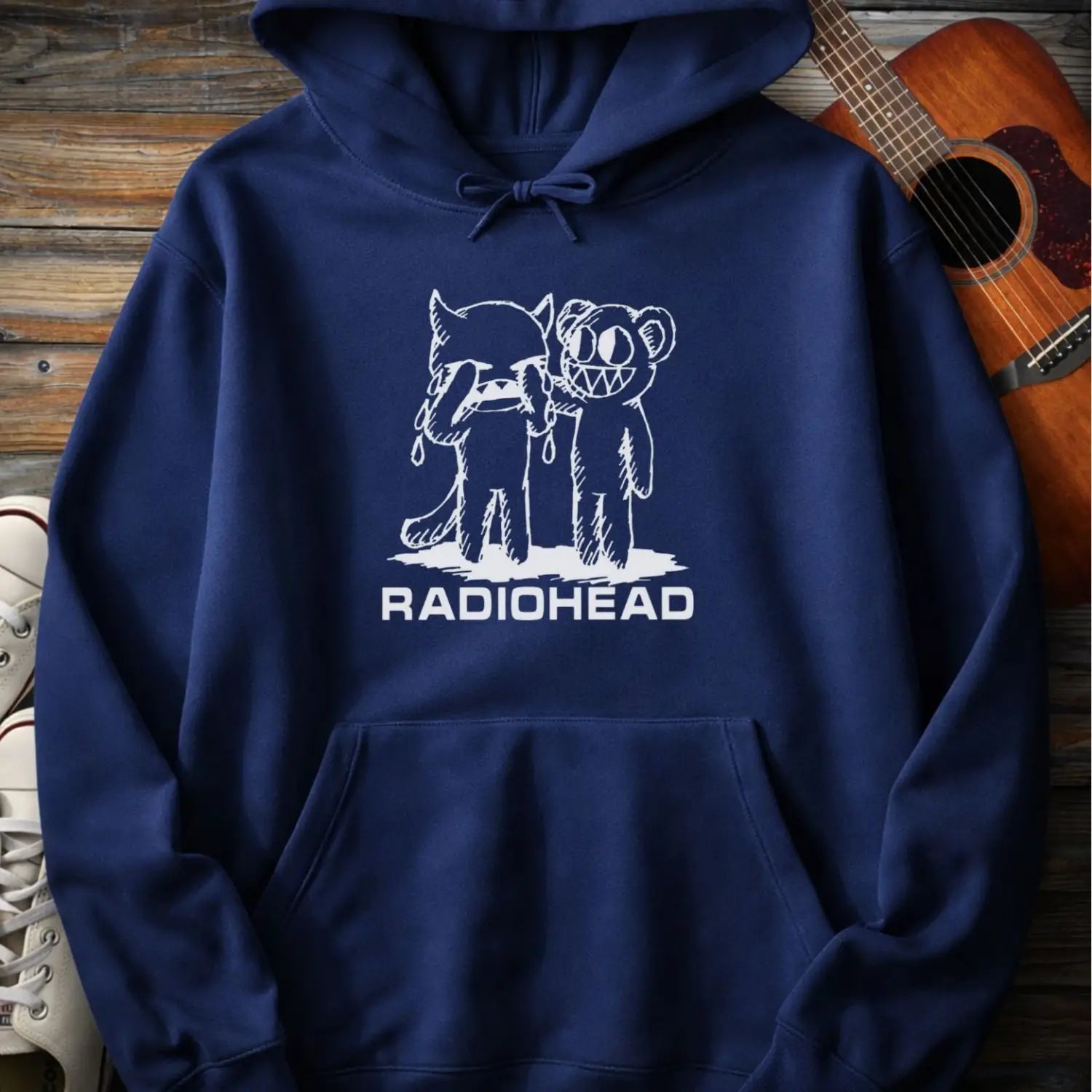 Navy pullover men women gildan hoodie with white bear character artwork graphic and “Radiohead” text design.