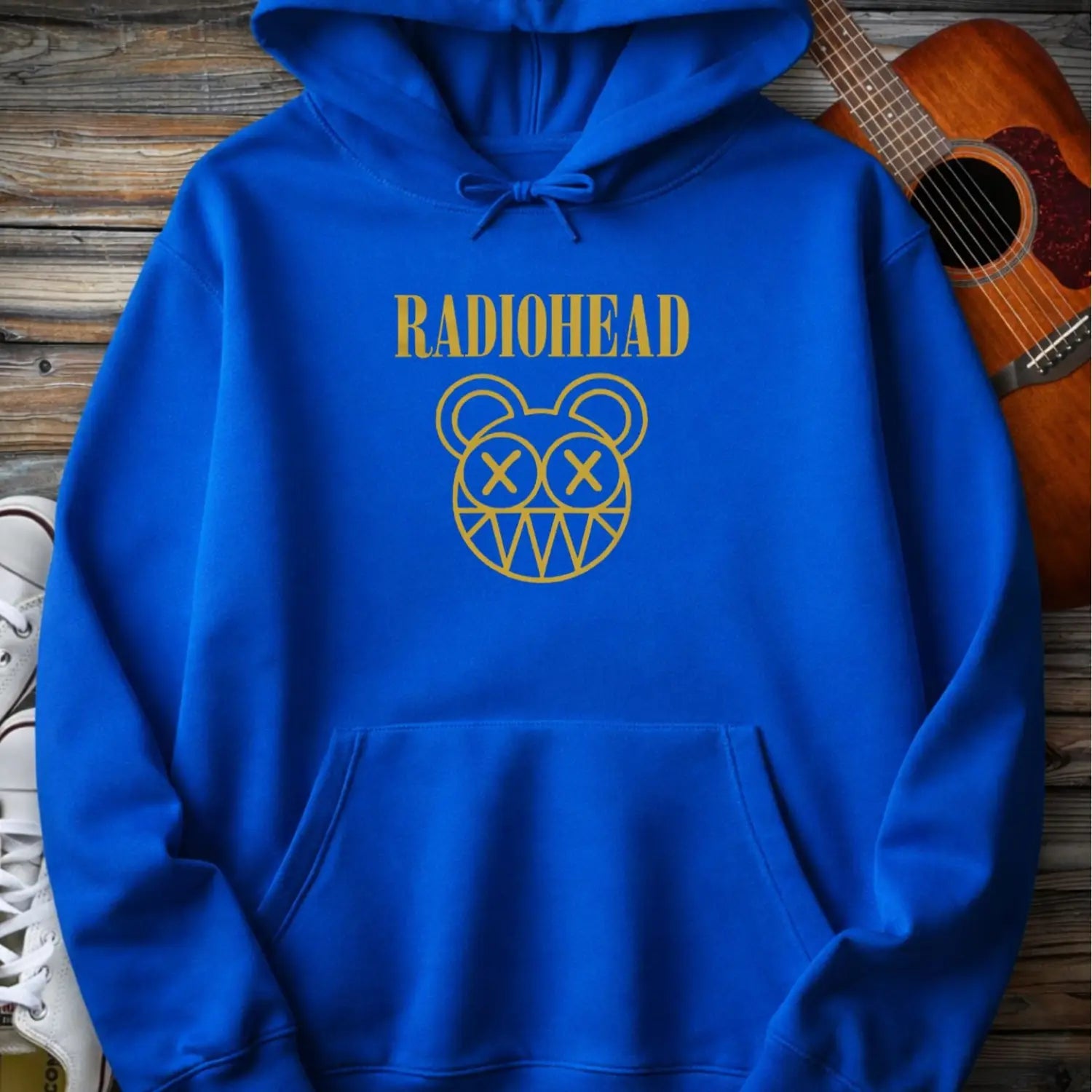 Royal blue color of adult men women pullover fleece Gildan hoodie featuring vintage radiohead rock band music logo