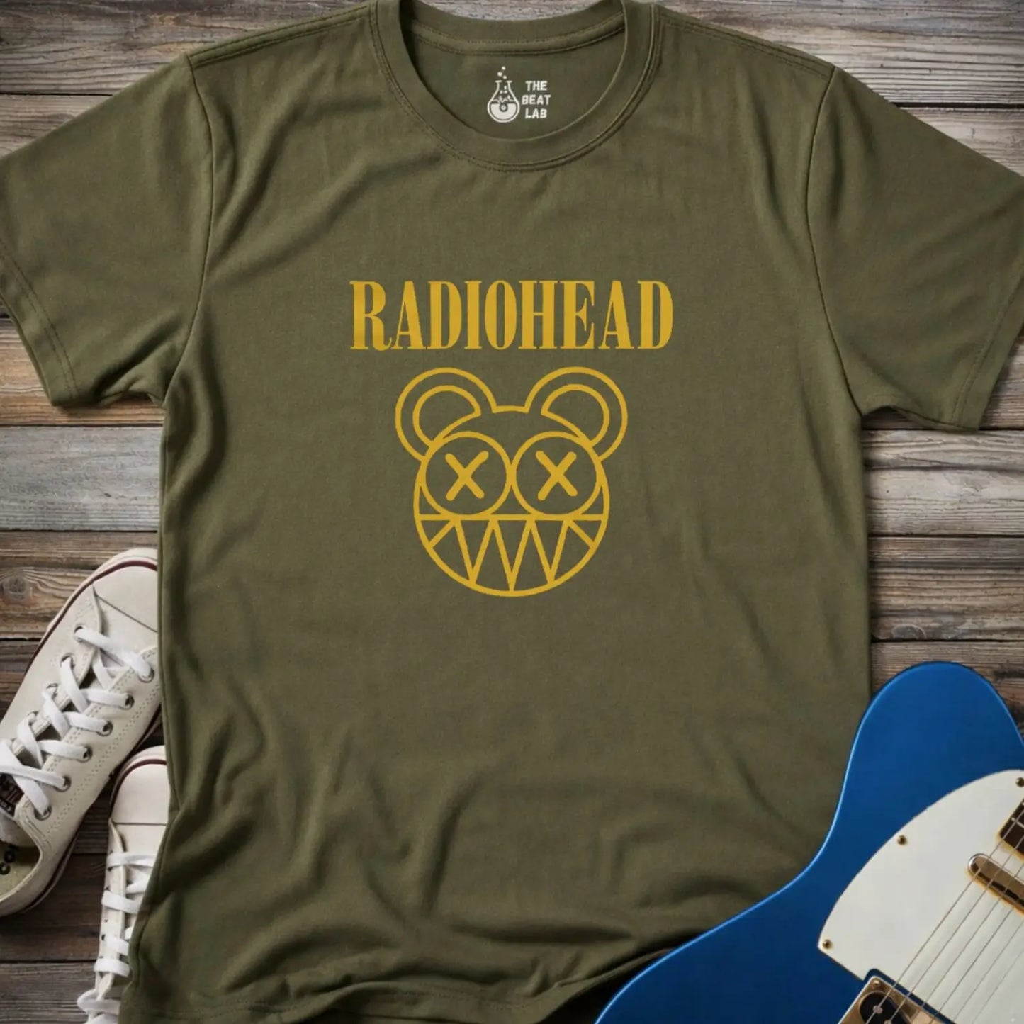 Military Green adult unisex Radiohead band logo gildan 64000 t-shirt with clean rock typography centered on the chest for minimalist music merch style
