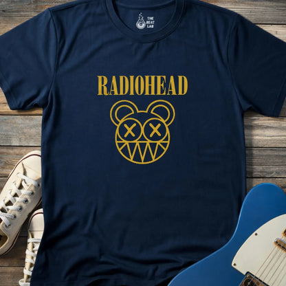Navy blue adult unisex Radiohead band logo gildan 64000 t-shirt with clean rock typography centered on the chest for minimalist music merch style