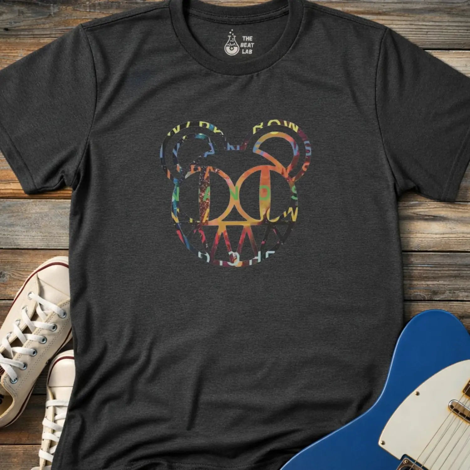 Dark heather grey unisex color Radiohead bear logo collage t-shirt with the iconic cartoon bear head combined with colorful album-inspired artwork for rock fans.