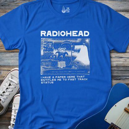 Royal blue color of adult women men gildan 64000 shirt featuring radiohead fast track comic art, vintage bandwear music shirt