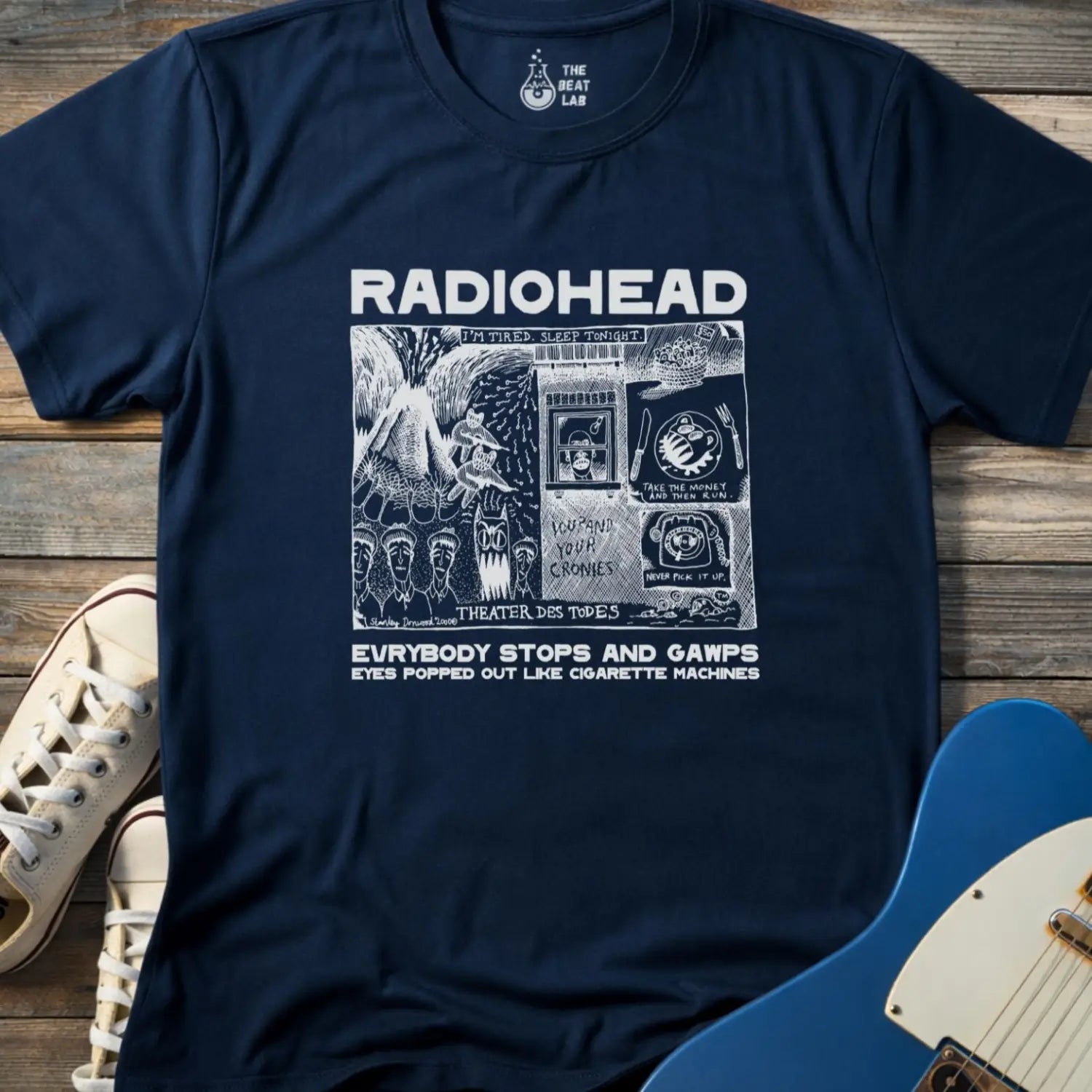 Navy blue adult men women unisex shirt featuring Radiohead comic art everybody stops and gawps eyes popped out like cigarette machines, vintage band music shirt