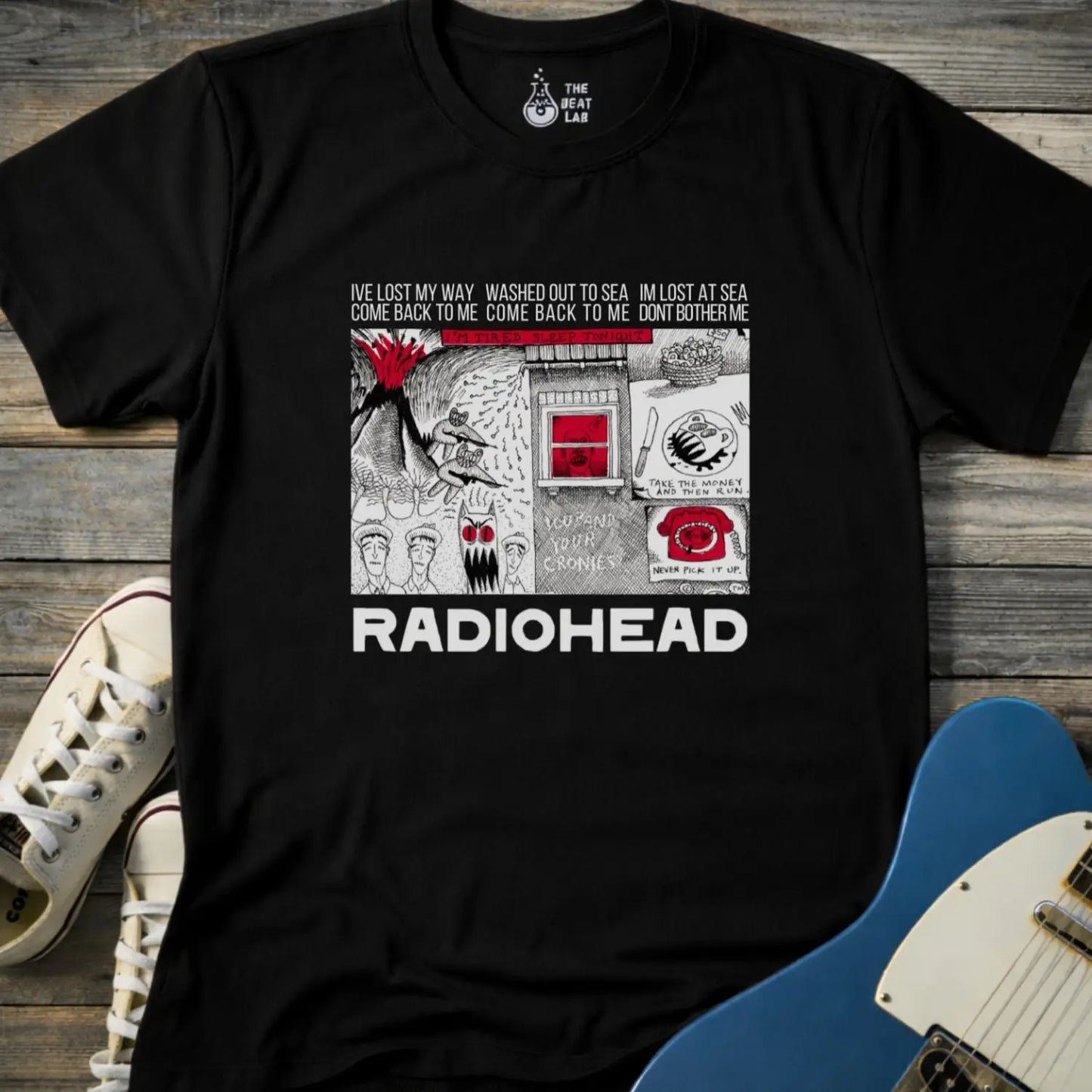 Black adult unisex gildan 64000 shirt featuring radiohead band metal, comic art music t-shirt