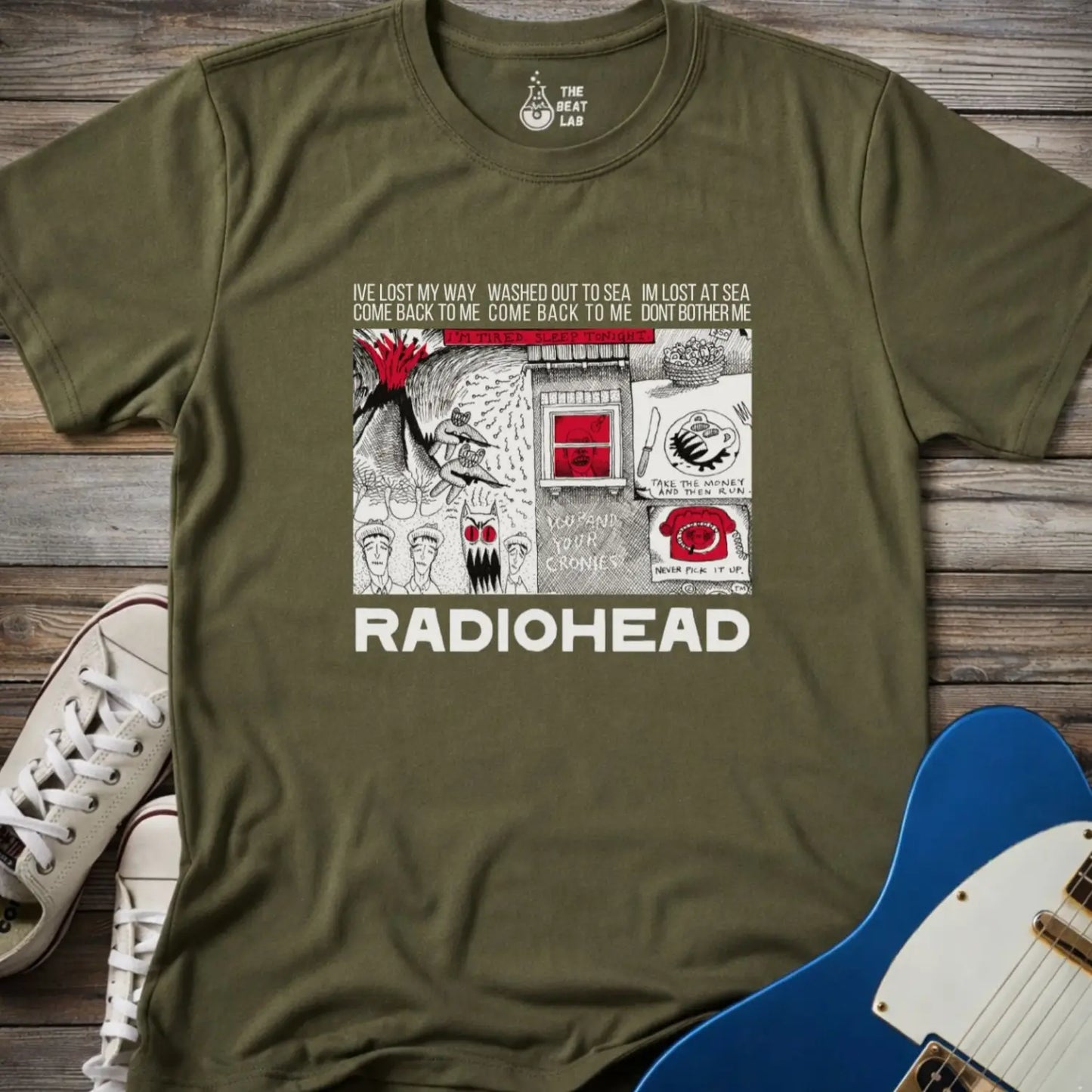Miltary green adult unisex gildan 64000 shirt featuring radiohead band metal, comic art music t-shirt