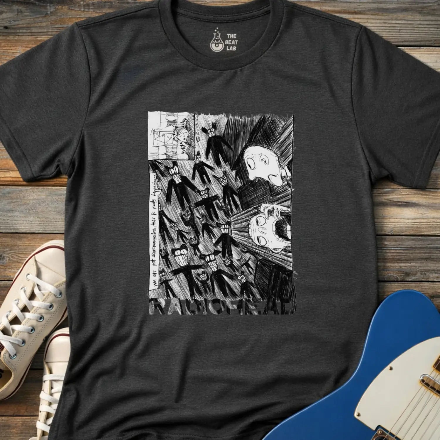 Dark heather grey shirt with black and white graphic design and 'Radiohead' text, classic vintage metal band shirt