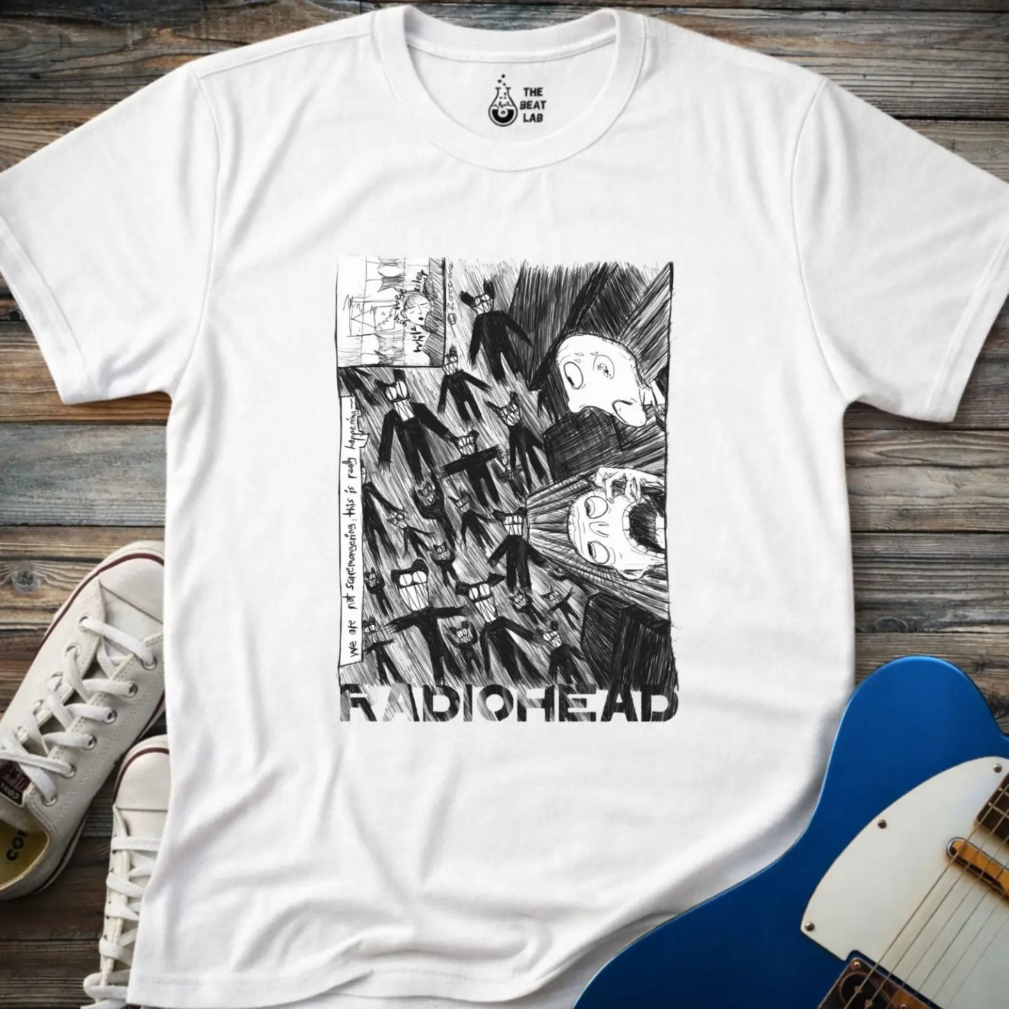 White shirt with black and white graphic design and 'Radiohead' text, classic vintage metal band shirt