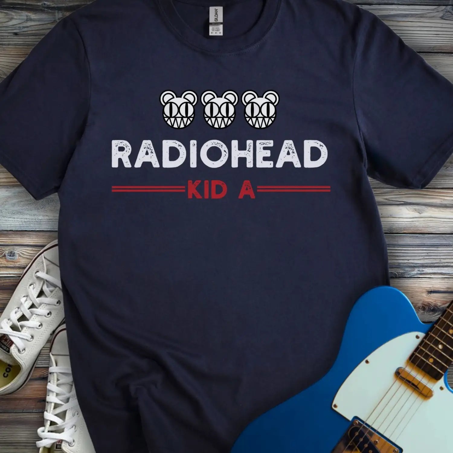 Dark blue crew neck t-shirt with a graphic design.