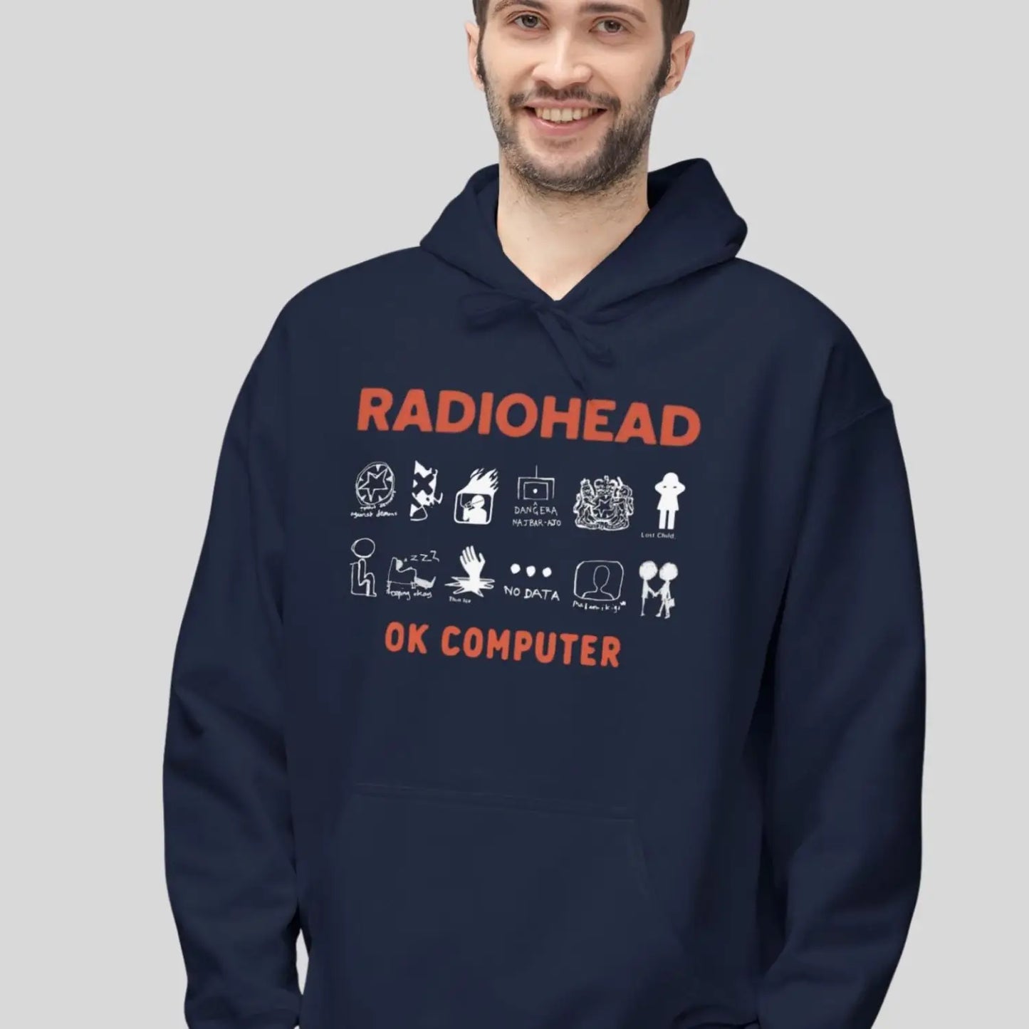 Man wearing navy blue pullover fleece Gildan SF500 hoodie featuring vintage radiohead ok computer album rock band music