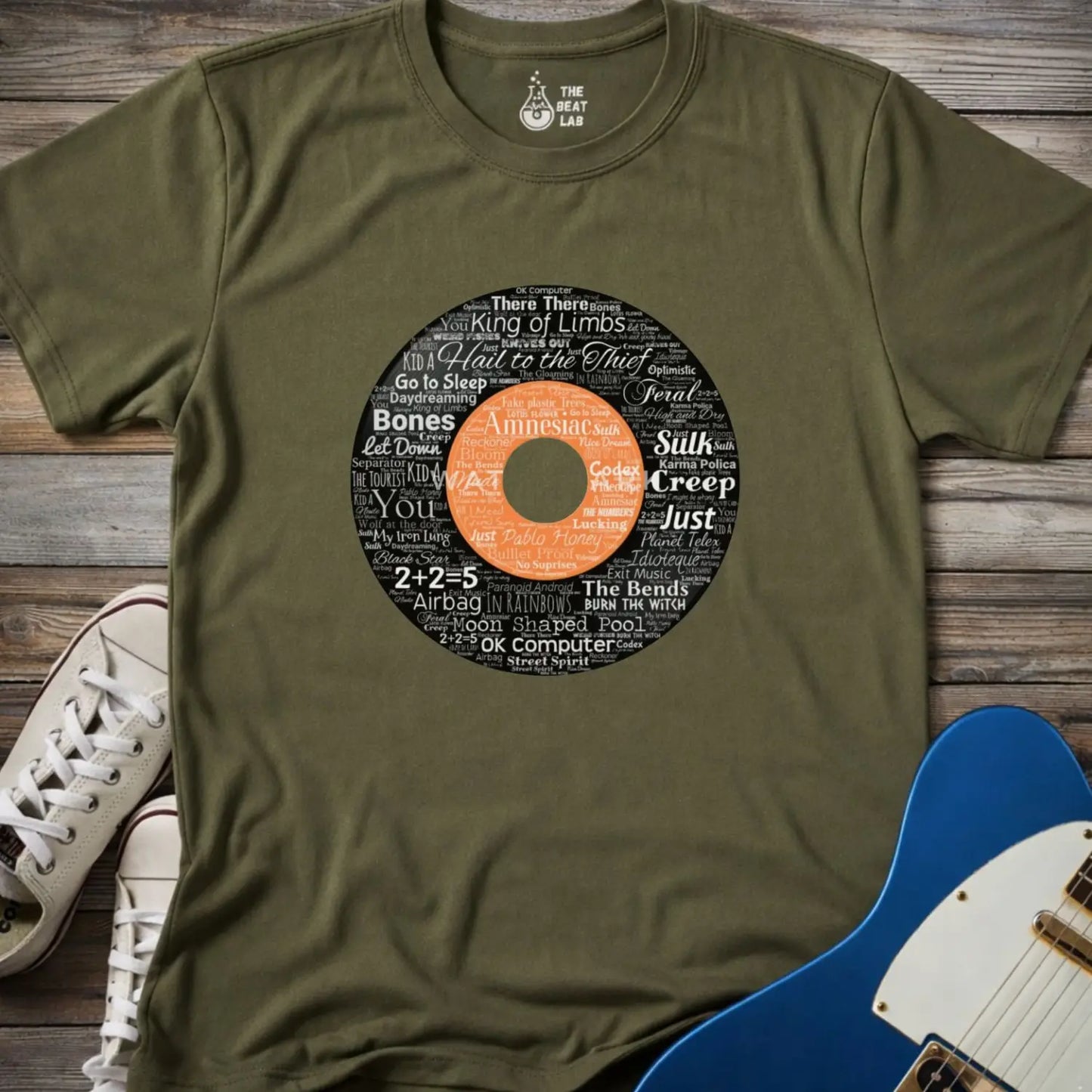Military green color unisex adult shirt featuring Radiohead rock band Albums collage