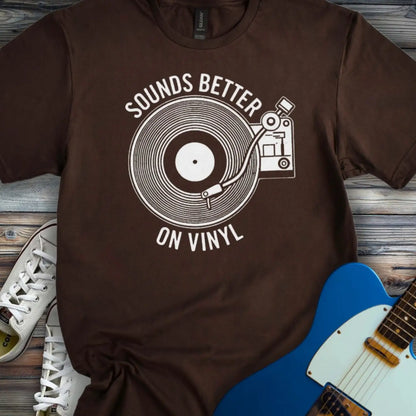Dark Chocolate color of graphic t-shirt with white vinyl record player design and “Sounds Better on Vinyl” music slogan for retro music lovers.