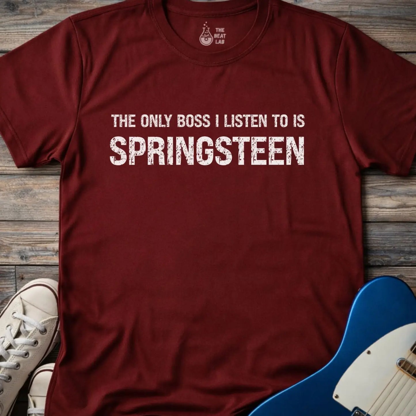 Maroon color of gildan 64000 t-shirt featuring funny music quote the only boss I listen to is springsteen, bruce springsteen shirt