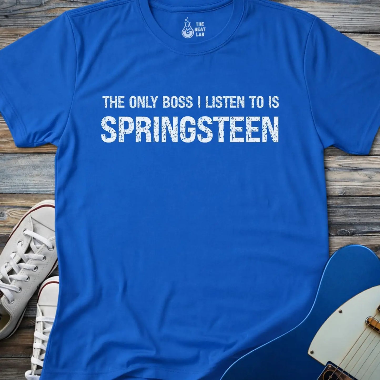 Royal blue color of gildan 64000 t-shirt featuring funny music quote the only boss I listen to is springsteen, bruce springsteen shirt