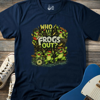 Navy blue adultt men women gildan 64000 shirt featuring Cartoon frog rock band graphic with text “Who Let The Frogs Out?” featuring guitarist, drummer, and singers with lightning bolts and music notes